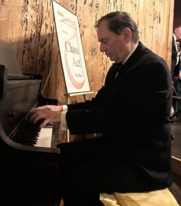 Musician Robert Haus playing piano